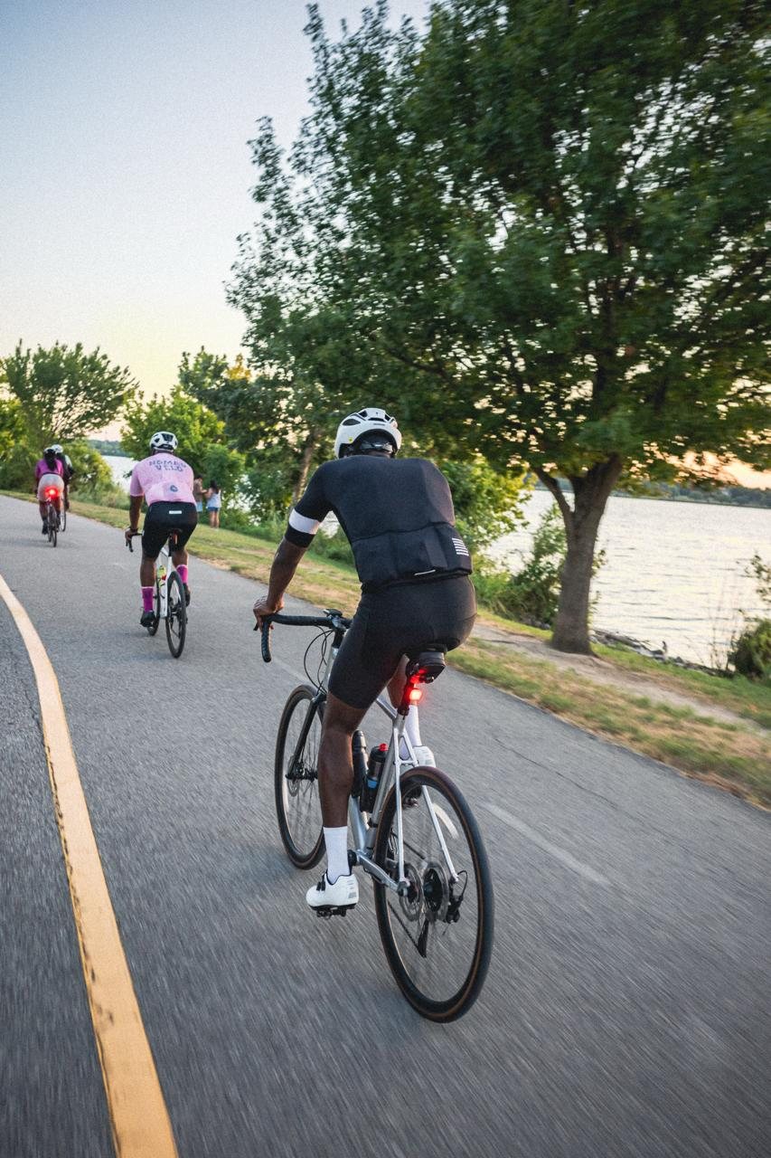 Riders on the path at sunset